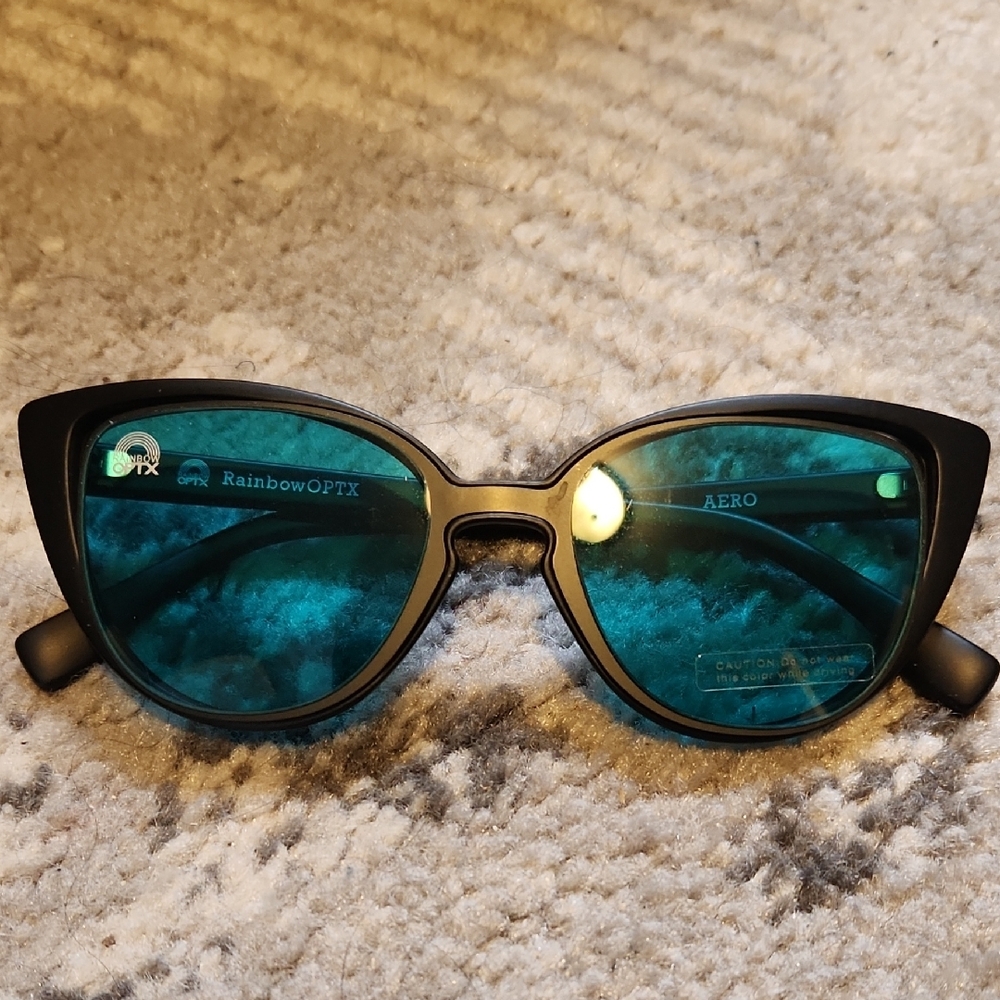 Rainbow OPTX Black Sunglasses With Blue-Green Lenses